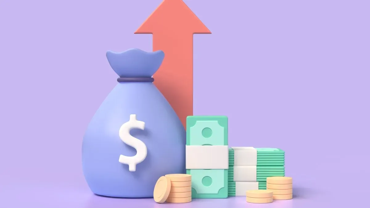 Calculadora financiera y billetes de pesos argentinos sobre un escritorio